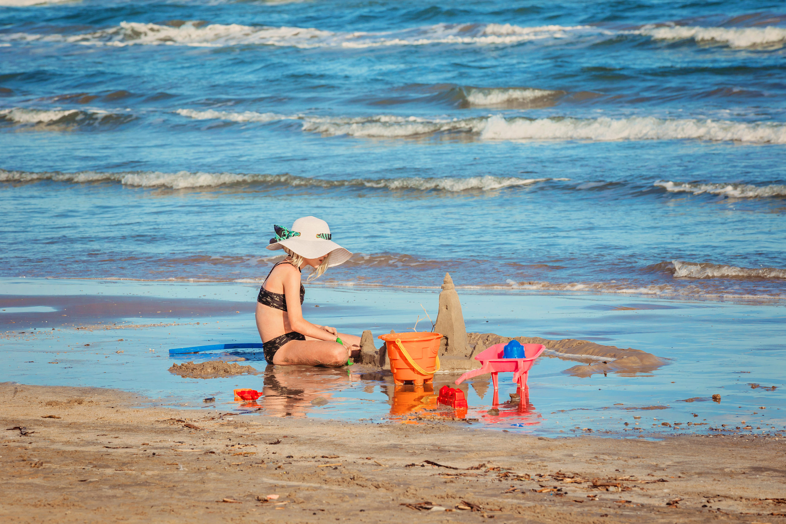 Bailey focused on building sandcastles