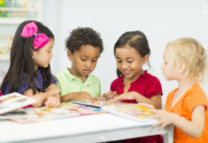 Diverse preschool children reading